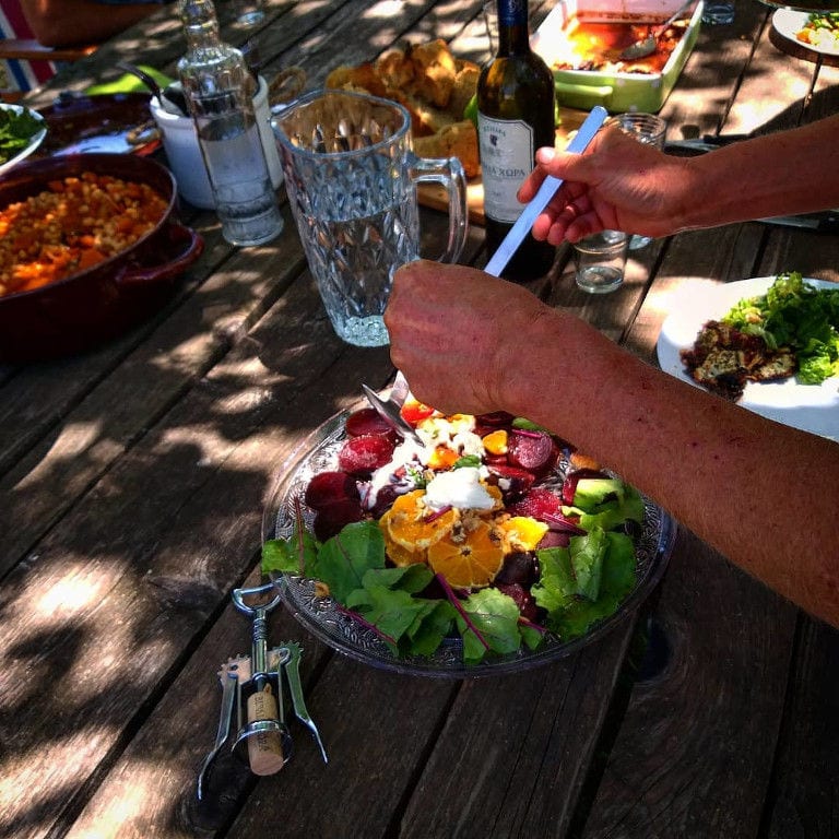 woman cooking salad at 'The Trinity Farm'